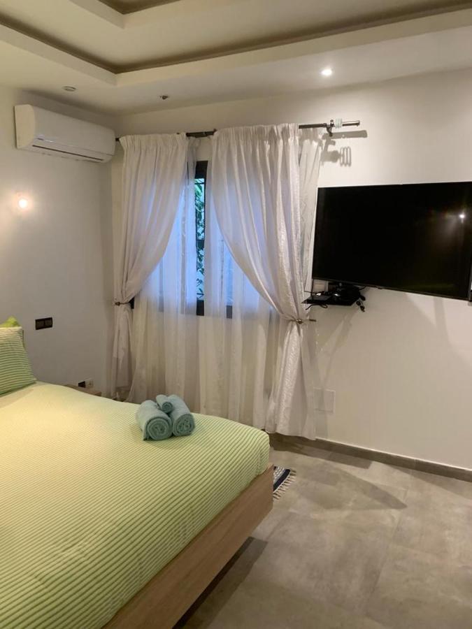 Luxury Suites Chester One Дакар Экстерьер фото